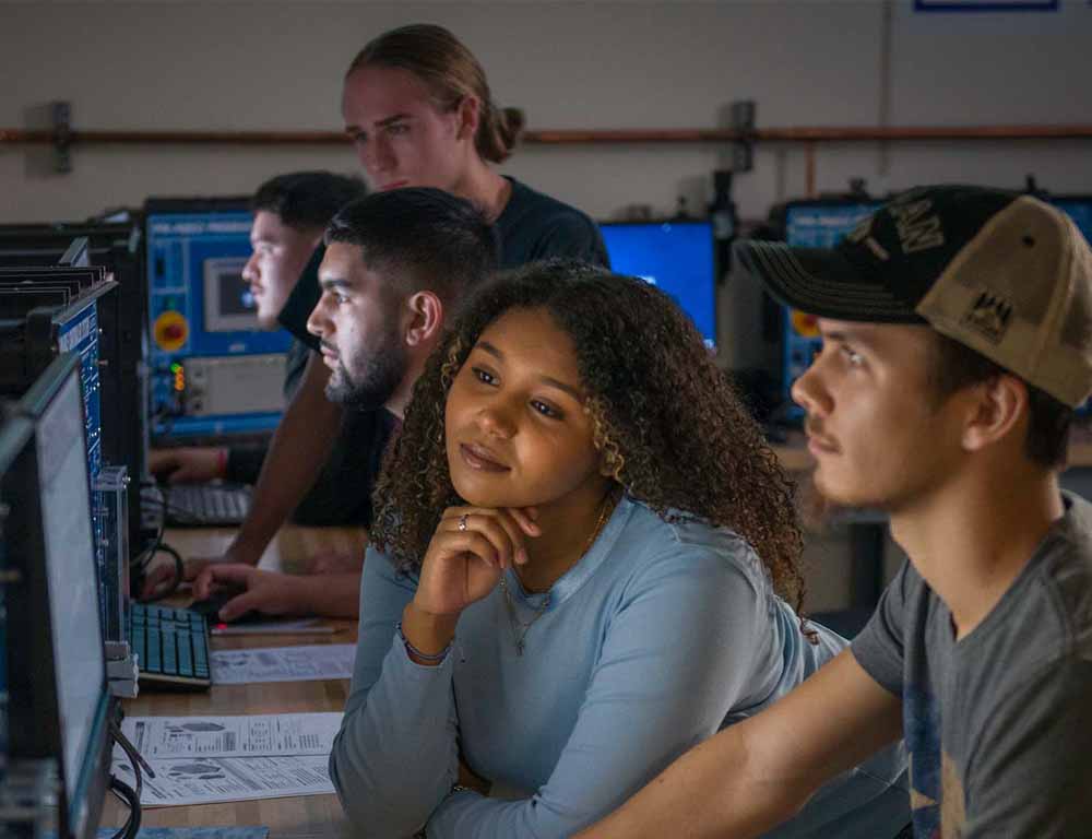 Instrumentation student in safety glasses