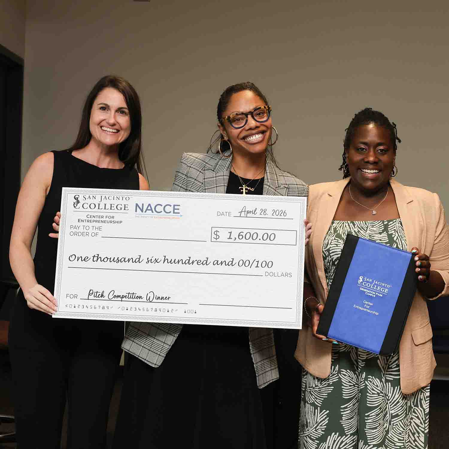 From left to right: Emcee Ashley Brown, first place winner Kasi Nayles, and Patricia Wells.