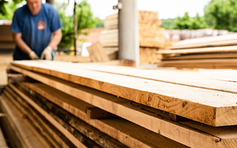 Stack of lumber outside hardware store